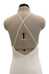 Recent Givenchy Ivory Crepe Silk Wrapped Angled Hem Dress w Cascading White Fringe