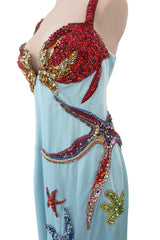 Phenomenal Spring 2021 Versace by Donatella Versace Runway Look 77 Embellished Starfish Dress