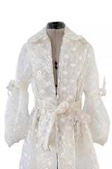 Spring 2017 Simone Rocha Runway Look 6 Transparent Raincoat w Embroidered Tulle Backing