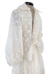 Spring 2017 Simone Rocha Runway Look 6 Transparent Raincoat w Embroidered Tulle Backing