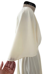 1970s Halston Draped Minimal Seamed Ivory Jersey Wrap Over Dress w Full Sleeves