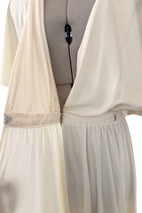 1970s Halston Draped Minimal Seamed Ivory Jersey Wrap Over Dress w Full Sleeves
