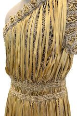 Outstanding Cruise 2011 Chanel by Karl Lagerfeld Runway Look 36 Gold Ribbon & Metallic Gold Cord Knit Dress
