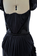 Fall 2005 Christian Dior by John Galliano Runway Look 51 Black Pleated Corset Dress