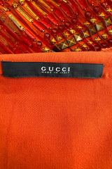 Iconic Spring 2011 Gucci by Frida Giannini Runway Look 41 Burnt Orange Silk Cord, Brass & Feather Dress