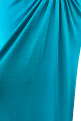 Spectacular Early 1970s Loris Azzaro Plunging Turquoise Silk Jersey w Open Rhinestone Rings