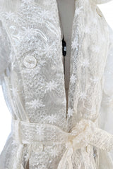 Spring 2017 Simone Rocha Runway Look 6 Transparent Raincoat w Embroidered Tulle Backing