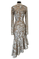 Spring 2018 Michael Kors Runway Look 72 Silver Sequin Dress on Nude Stretch Net w Asymmetrical Hem