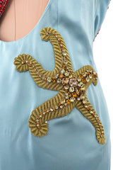 Phenomenal Spring 2021 Versace by Donatella Versace Runway Look 77 Embellished Starfish Dress