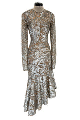 Spring 2018 Michael Kors Runway Look 72 Silver Sequin Dress on Nude Stretch Net w Asymmetrical Hem