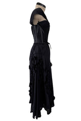Fall 2005 Christian Dior by John Galliano Runway Look 51 Black Pleated Corset Dress