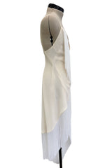 Recent Givenchy Ivory Crepe Silk Wrapped Angled Hem Dress w Cascading White Fringe