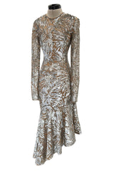 Spring 2018 Michael Kors Runway Look 72 Silver Sequin Dress on Nude Stretch Net w Asymmetrical Hem