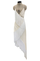 Recent Givenchy Ivory Crepe Silk Wrapped Angled Hem Dress w Cascading White Fringe