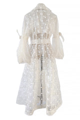 Spring 2017 Simone Rocha Runway Look 6 Transparent Raincoat w Embroidered Tulle Backing