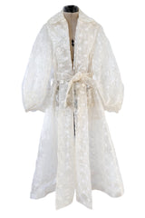 Spring 2017 Simone Rocha Runway Look 6 Transparent Raincoat w Embroidered Tulle Backing