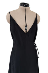Unusual 1990s Louis Feraud Partial Wrap Black Jersey Dress w Cut Out Stacked Circle Hem