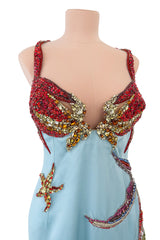 Phenomenal Spring 2021 Versace by Donatella Versace Runway Look 77 Embellished Starfish Dress