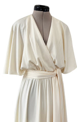 1970s Halston Draped Minimal Seamed Ivory Jersey Wrap Over Dress w Full Sleeves