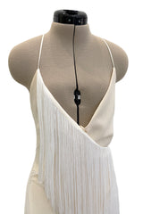 Recent Givenchy Ivory Crepe Silk Wrapped Angled Hem Dress w Cascading White Fringe