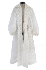 Spring 2017 Simone Rocha Runway Look 6 Transparent Raincoat w Embroidered Tulle Backing