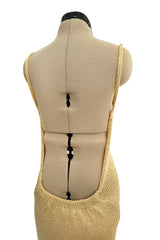 Amazing 1990s Gianni Versace Gold Metallic Knit Dress w Open or Lace up Back & Side Slit