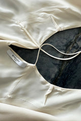 Recent Givenchy Ivory Crepe Silk Wrapped Angled Hem Dress w Cascading White Fringe