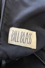 Chic 1970s Bill Blass One Shoulder Cut Out Little Black Light Weight Silk Dress w Silk Sash Tie