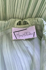Exquisite 1970s Mary McFadden Back & Front Plunging Mint Green Pleated Dress