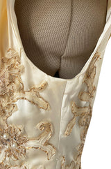 Incredible 1950s Ceil Chapman Ivory Silk Satin Dress w Gold Metal Ribbon Detailing