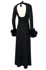 1970s Unlabeled Open Back Black Jersey Dress w Glossy Feather Cuffs