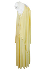 1970s Unlabeled Light Yellow Jersey Layered & Tiered Halter Dress