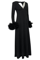 1970s Unlabeled Open Back Black Jersey Dress w Glossy Feather Cuffs