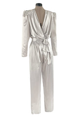 Amazing 1980s Flora Kung Pale Silver Satin Jumpsuit w Plunge Neckline & Tie Waist