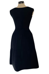 Outstanding 1960s Norman Norell Black Wool Crepe Dress w Full Tiered Skirting