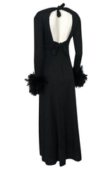 1970s Unlabeled Open Back Black Jersey Dress w Glossy Feather Cuffs
