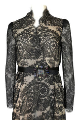 Fall 2010 Alexander McQueen Black Scalloped Lace Wrap Dress