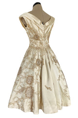 Incredible 1950s Ceil Chapman Ivory Silk Satin Dress w Gold Metal Ribbon Detailing