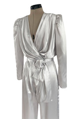 Amazing 1980s Flora Kung Pale Silver Satin Jumpsuit w Plunge Neckline & Tie Waist