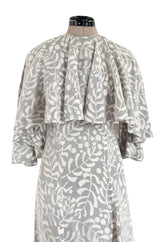 1970s James Galanos Soft Pale Grey & White Floral Print Silk & Silk Chiffon Caped Dress
