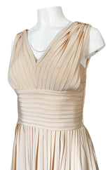 1960s Unlabeled Norman Norell Creamy Ivory Silk Knife Pleat Dress