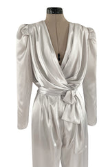 Amazing 1980s Flora Kung Pale Silver Satin Jumpsuit w Plunge Neckline & Tie Waist