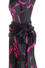 Fall 1985 Unlabeled Ady Couture for YSL Black Silk Hip Swag Dress w Pink Bow Print