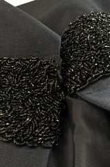 1950s Black Silk Evening Coat w Heavy Beading at the Hem, Cuffs & Waist