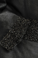 1950s Black Silk Evening Coat w Heavy Beading at the Hem, Cuffs & Waist