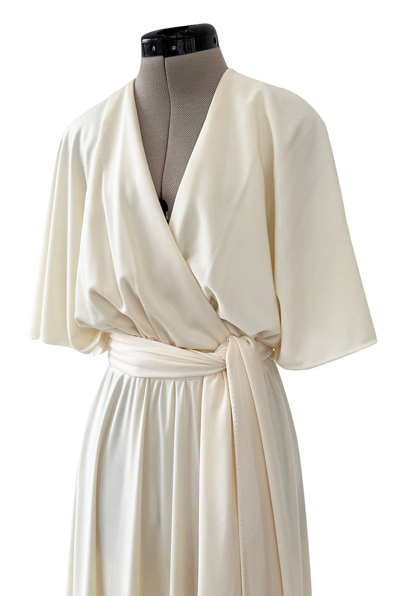 1970s Halston Draped Minimal Seamed Ivory Jersey Wrap Over Dress w Full Sleeves