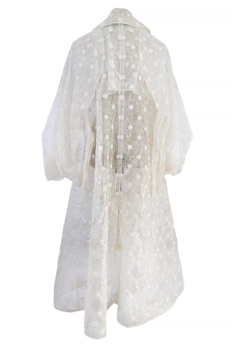 Spring 2017 Simone Rocha Runway Look 6 Transparent Raincoat w Embroidered Tulle Backing