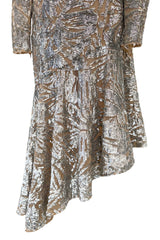 Spring 2018 Michael Kors Runway Look 72 Silver Sequin Dress on Nude Stretch Net w Asymmetrical Hem