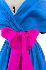 Prettiest 1980s Adele Simpson Blue Silk Plunge Wrap Dress w Brilliant Pink Sash & Caped Shoulders
