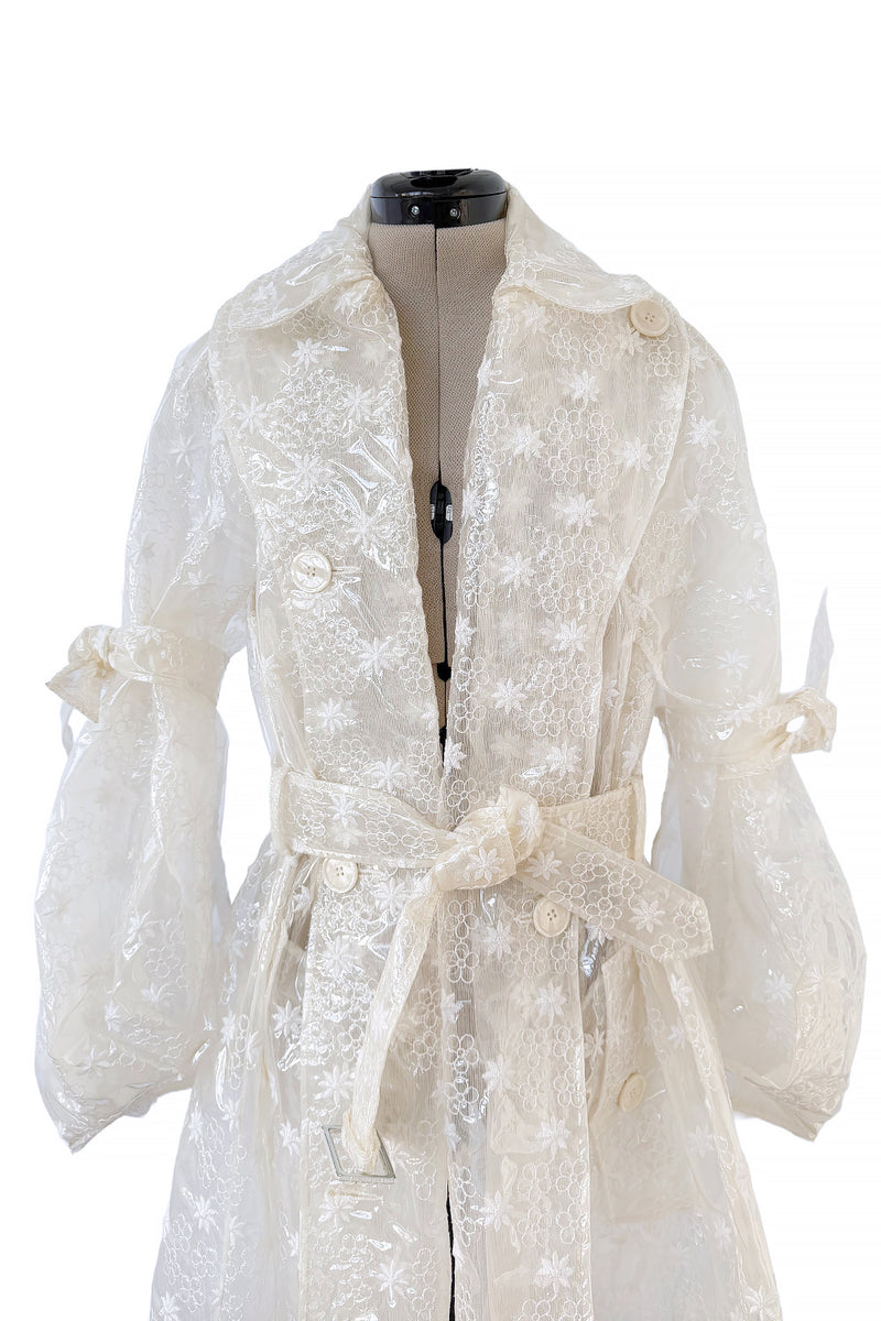 Spring 2017 Simone Rocha Runway Look 6 Transparent Raincoat w Embroidered Tulle Backing